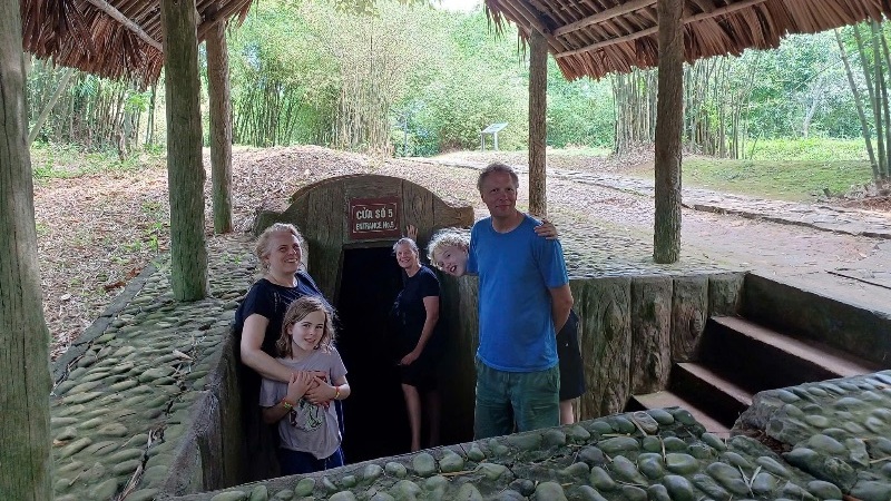 A collage-style view of key Vietnam DMZ sites near Hue, including historic bridges, tunnels, and countryside roads with a tour vehicle, representing a guided DMZ tour experience.